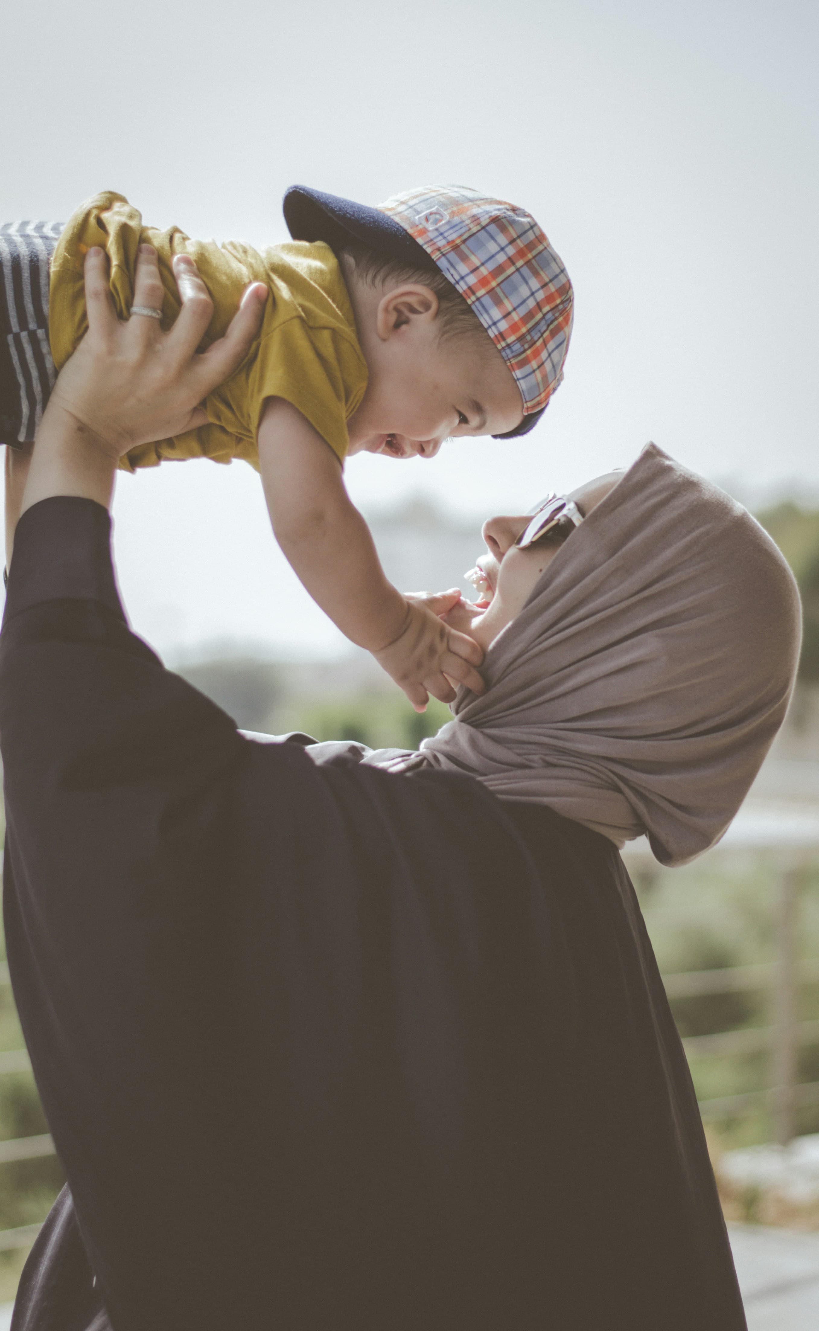 Mom holding her son