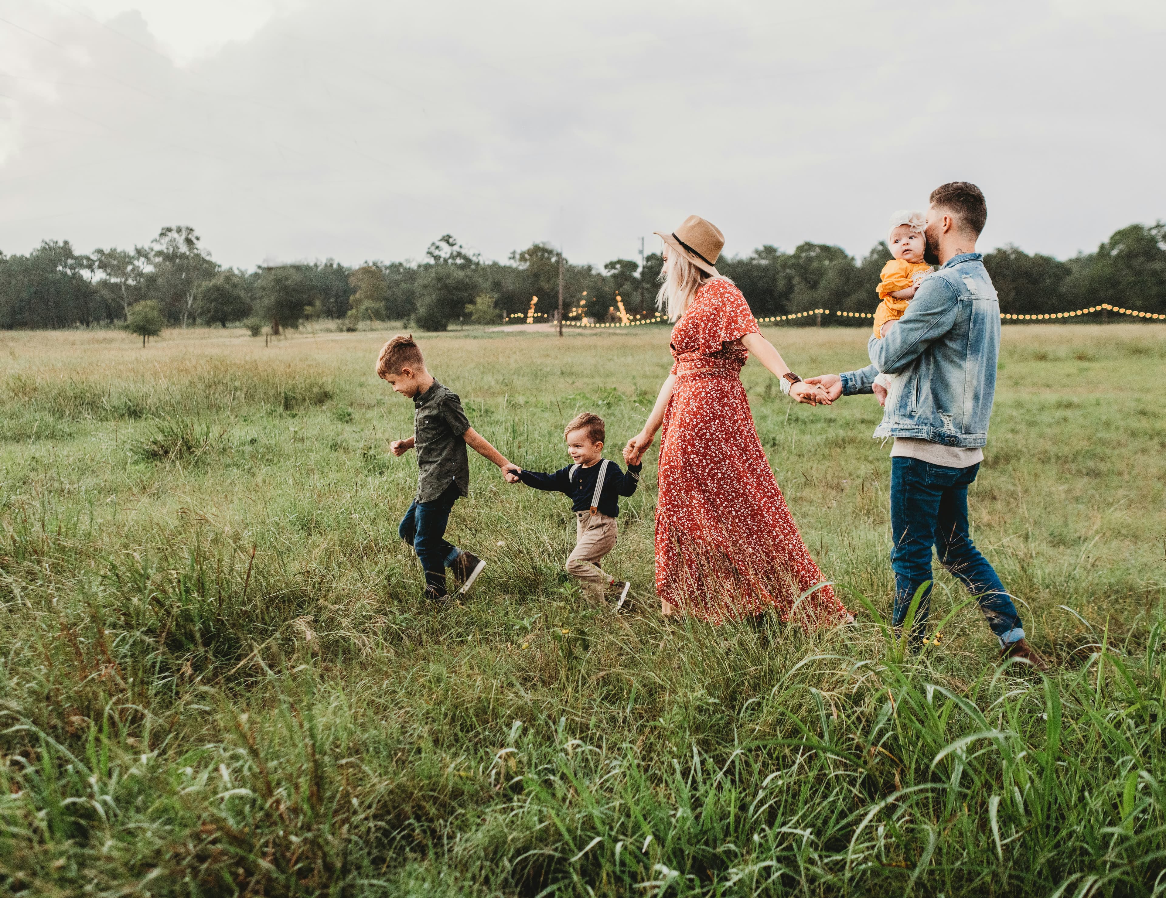 Family walking in field